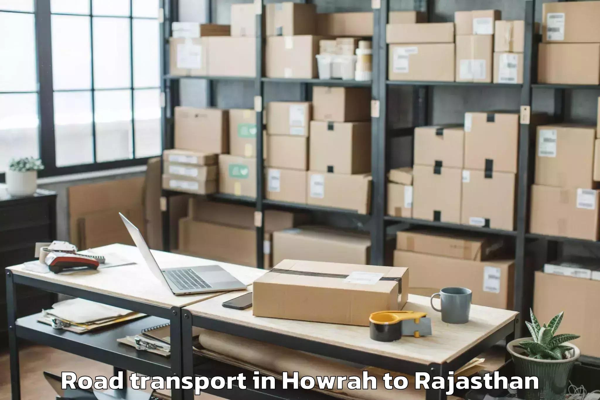 Affordable Howrah to Churu Road Transport